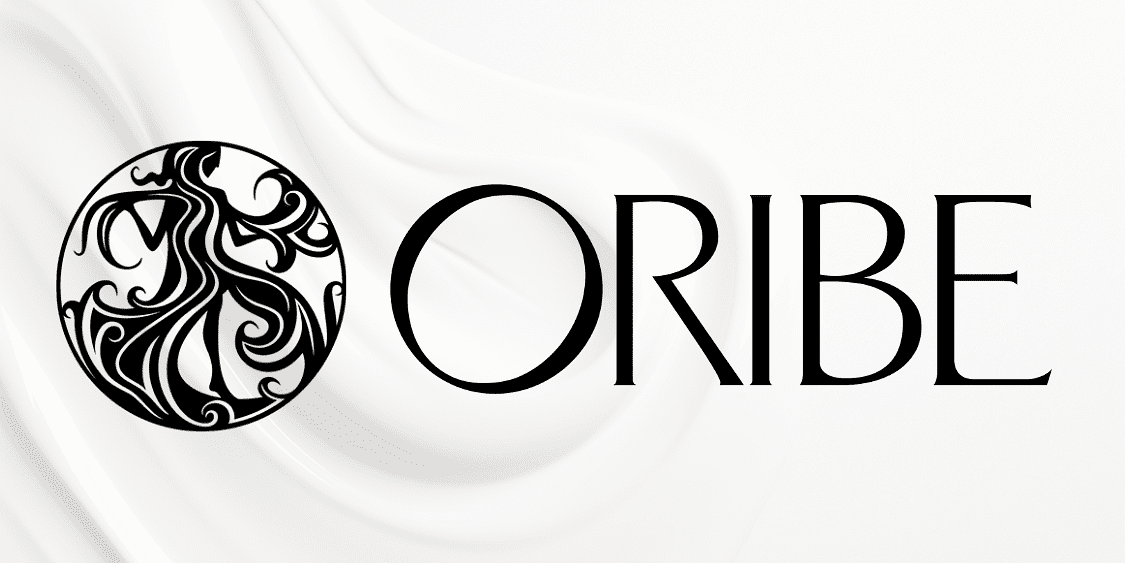 Oribe logo with elegant black design on a smooth, flowing white background.