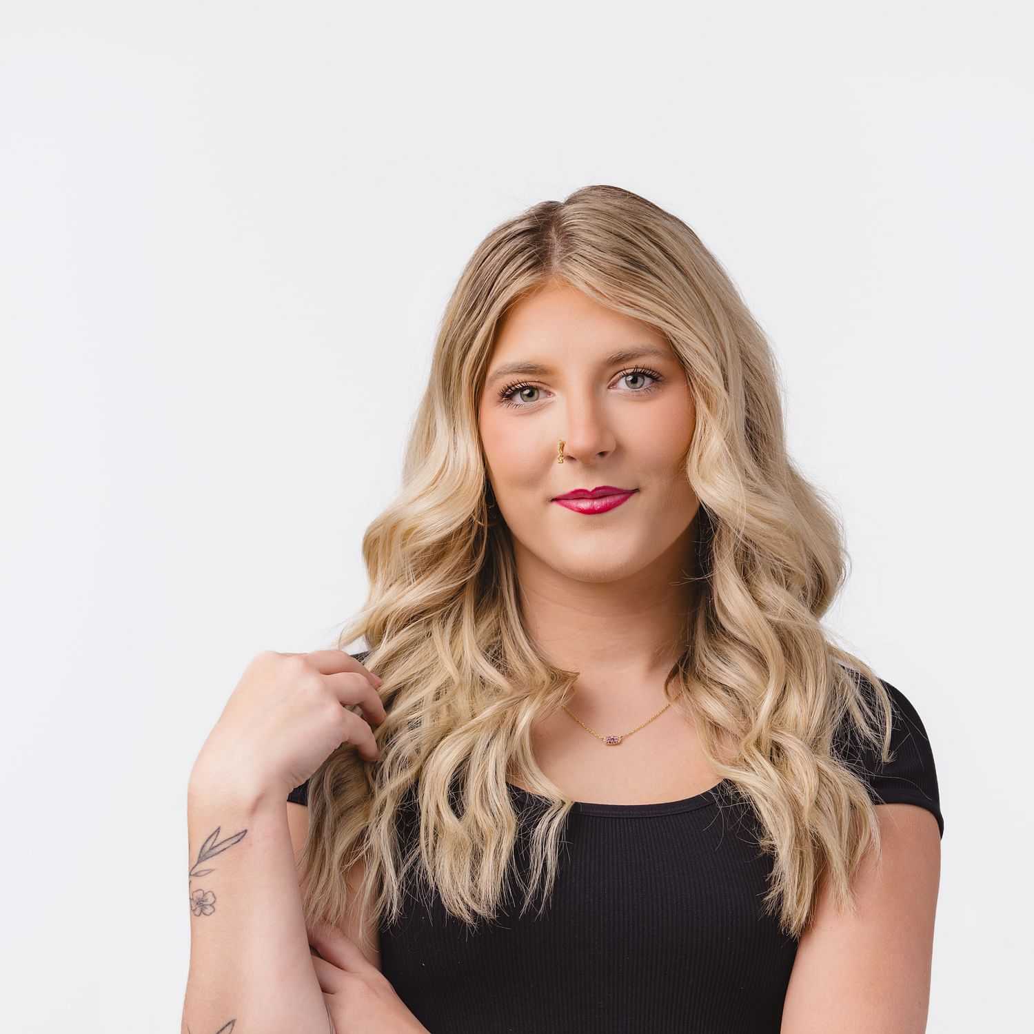 Portrait of Claudia Johnson, a professional stylist at Bobby Cooper, showcasing their expertise and style.