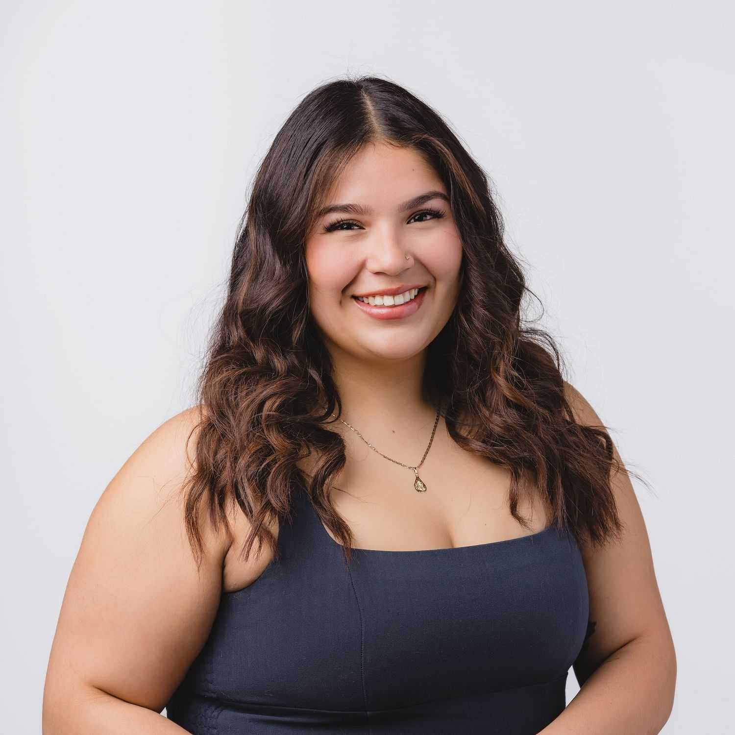 Portrait of Nathaly, a professional stylist at Bobby Cooper, showcasing their expertise and style.