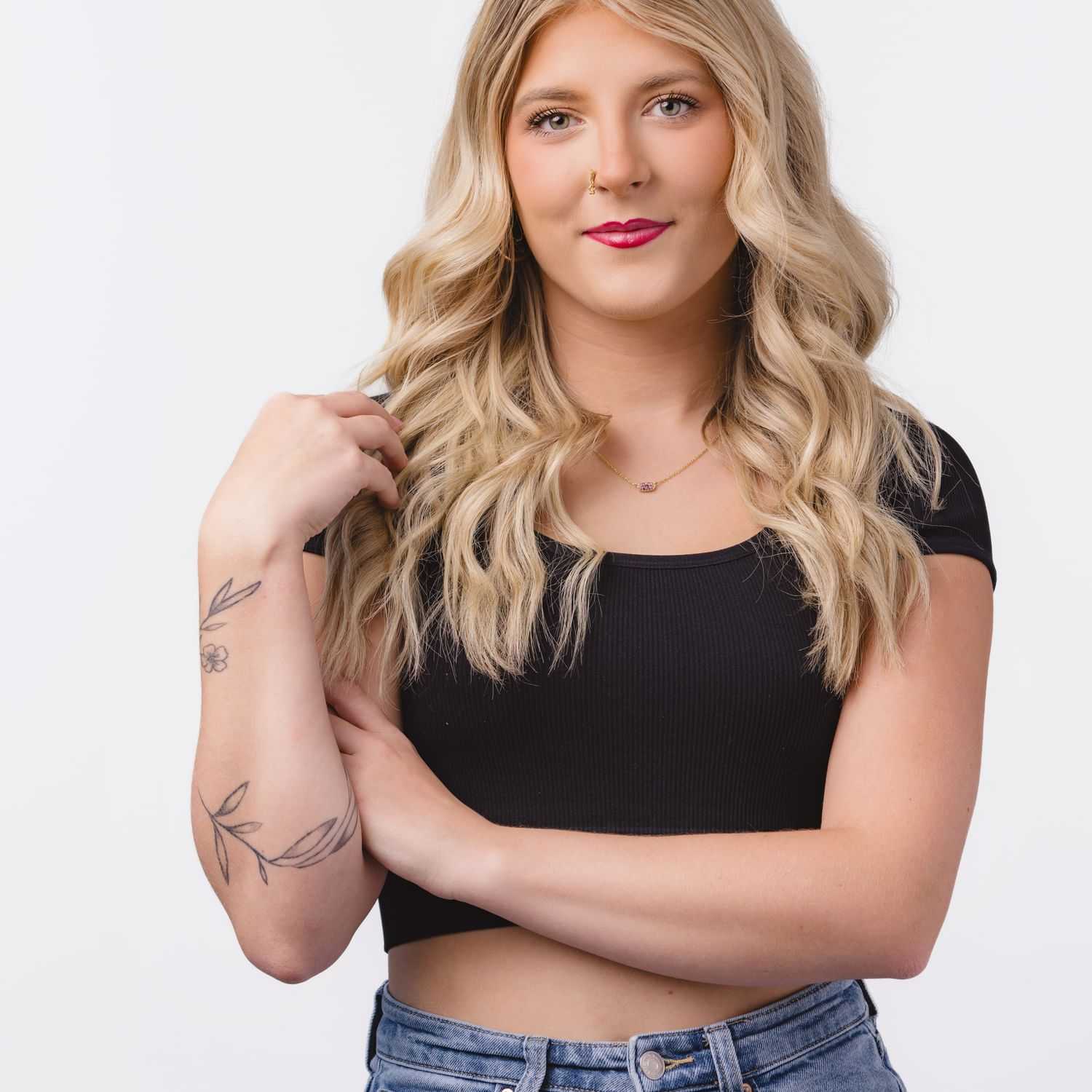 Portrait of Claudia Johnson, a professional stylist at Bobby Cooper, showcasing their expertise and style.