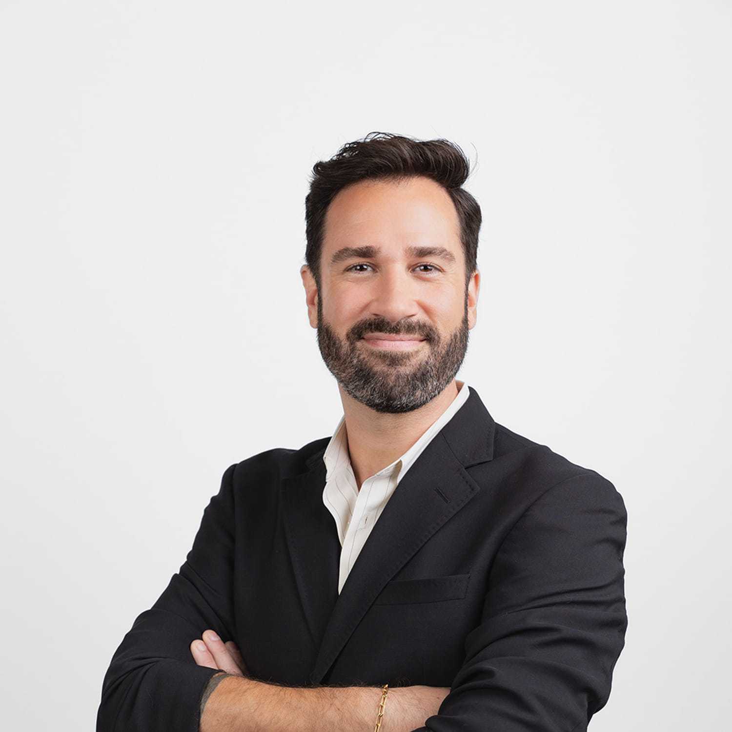 Portrait of Bryan Cooper, a professional stylist at Bobby Cooper, showcasing their expertise and style.