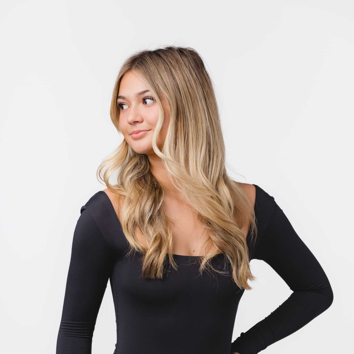 Portrait of Brooklyn, a professional stylist at Bobby Cooper, showcasing their expertise and style.