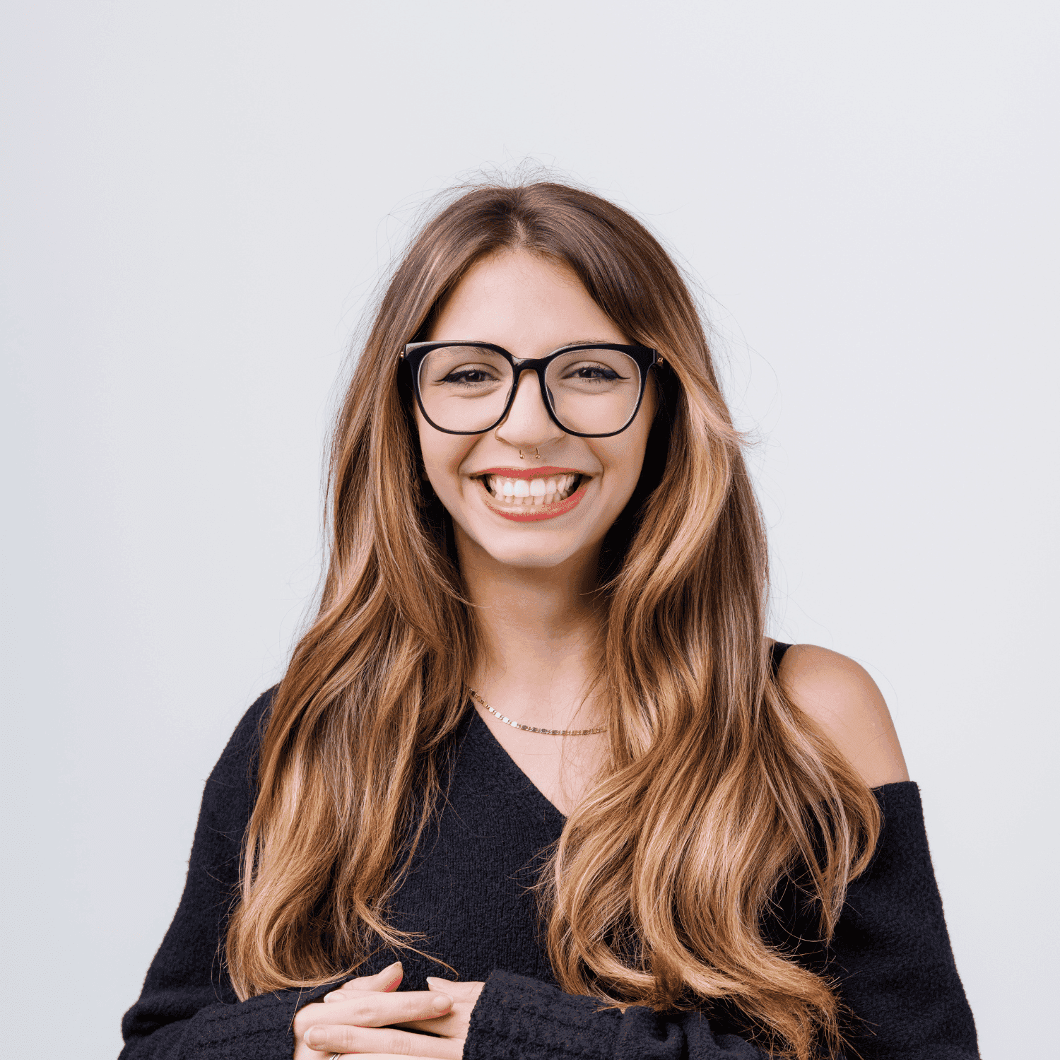 Portrait of Kassidy, a professional stylist at Bobby Cooper, showcasing their expertise and style.