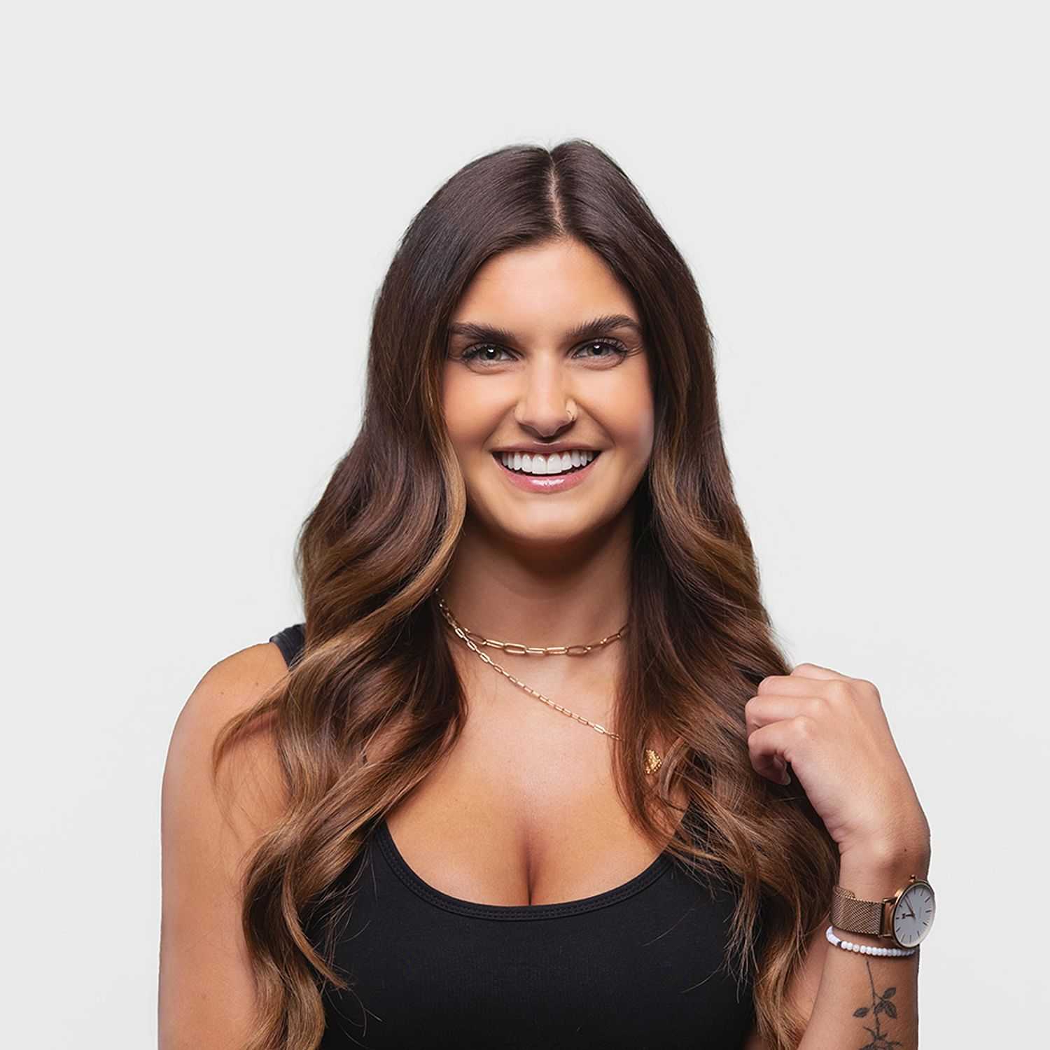 Portrait of Becca Schoenenberger, a professional stylist at Bobby Cooper, showcasing their expertise and style.