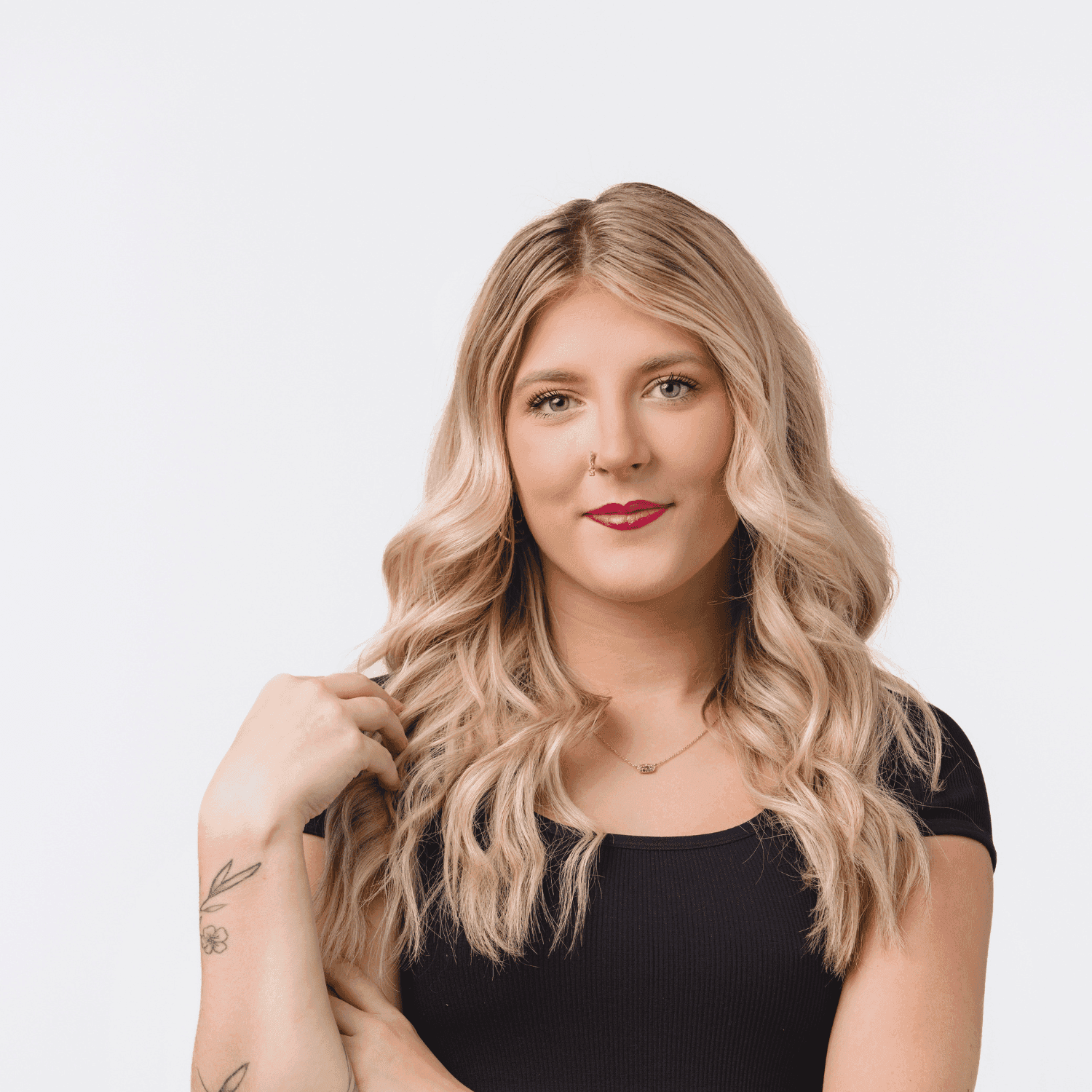 Portrait of Claudia, a professional stylist at Bobby Cooper, showcasing their expertise and style.