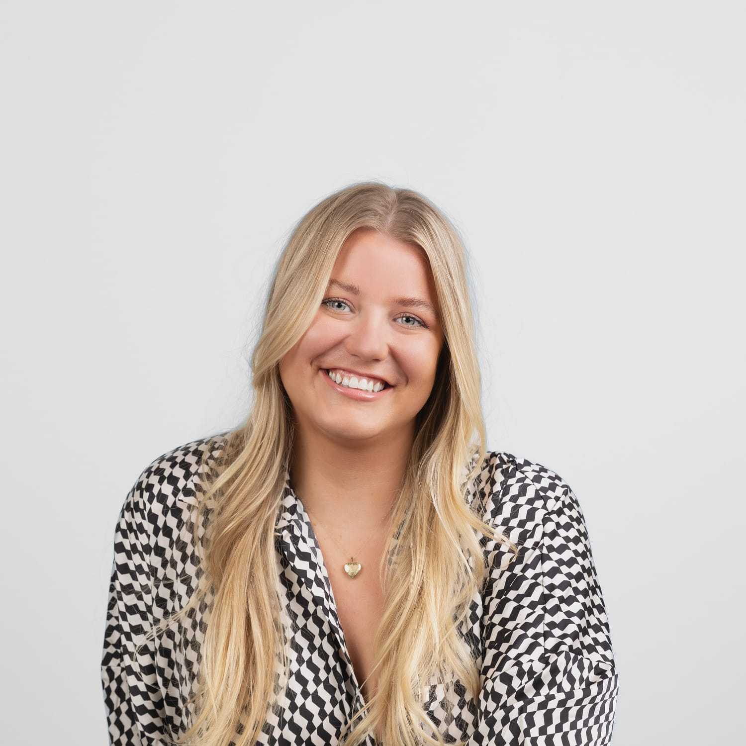 Portrait of Liz, a professional stylist at Bobby Cooper, showcasing their expertise and style.