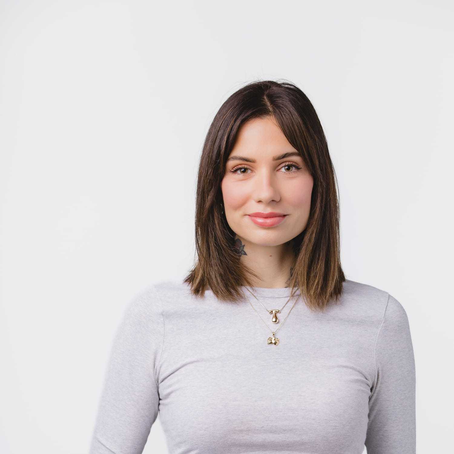 Portrait of Tamara, a professional stylist at Bobby Cooper, showcasing their expertise and style.