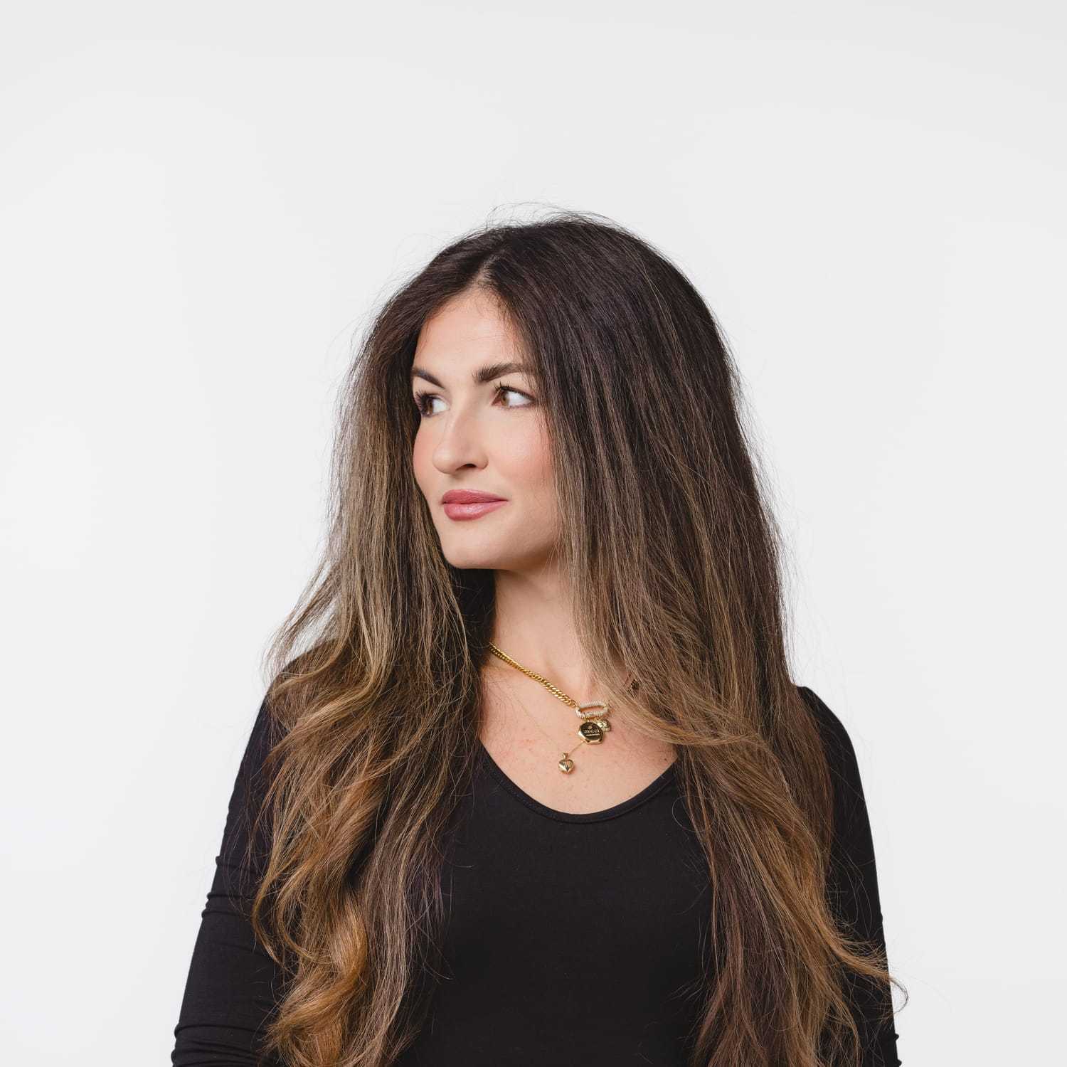 Portrait of Rachel, a professional stylist at Bobby Cooper, showcasing their expertise and style.